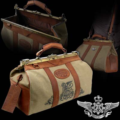 Travel around the World with fortitude and distinction; a classic Gladstone style hold-all with detachable shoulder strap. Made of stout, leather-reinforced canvas, with leather & satin lining and branded tags and badges. Approx. dimensions: 48cm (19") wide X 29cm (11") high X 21.5cm (8") deep. 